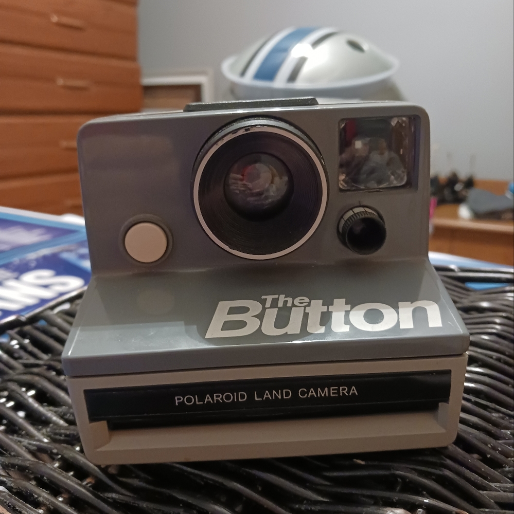 Vintage polaroid the button
